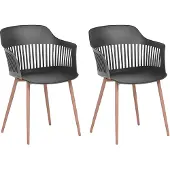 Beliani Lot de 2 chaises de salle à manger en matière synthétique noire pieds en métal dossier ouvert style moderne salon salle à manger