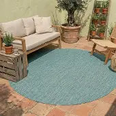 NATURL. Tapis d'extérieur rond - Costa Turquoise | Ø 120 cm | Rond | Tissage plat