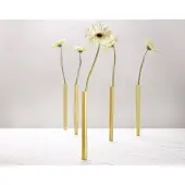 Peleg DESIGN Les vases magnetiques pa design sont des vases en alu qui s'aimantent sous la nappe