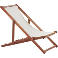 Beliani Chaise longue de jardin en bois d'acacia brun foncé, revêtement blanc crème, chaise de plage pliante
