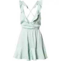 NA-KD Combinaison coupe ample avec imprimé à pois et décolleté dans le dos