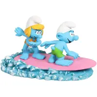 Diverse Figure Smurfette And Smurf On A Surfboard