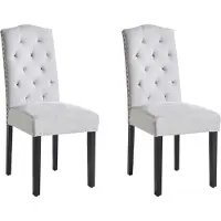 Beliani Lot de 2 chaises en velours gris avec pieds en métal noir pour une salle à manger au style minimaliste