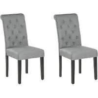 Beliani Ensemble de 2 chaises rembourrées grises avec pieds en bois noir pour salle à manger de style glamour