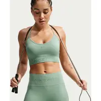 Nike Brassière de sport rembourrée à maintien léger Pro Seamless pour femme - Vert | Taille XS