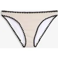 Bonprix Bas de maillot orné d’une broderie