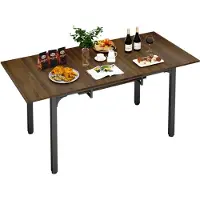 Puluomis Table de salle à manger extensible 110-149 cm réglable, avec espace de rangement Plateau MDF, pieds réglables inclus pour 4-8 personnes noir marron