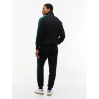 Tommy Hilfiger Survêtement 'ESS' jade / noir