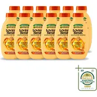 Garnier 12 flacons de shampooing Loving Blends, gamme "Honoring Goud", pour cheveux abîmés et fragilisés, 300 ml - Pack économique - 12 pièces